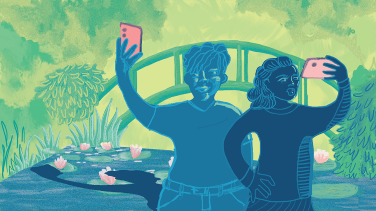 Visitors take selfies at the immersive Monet show.