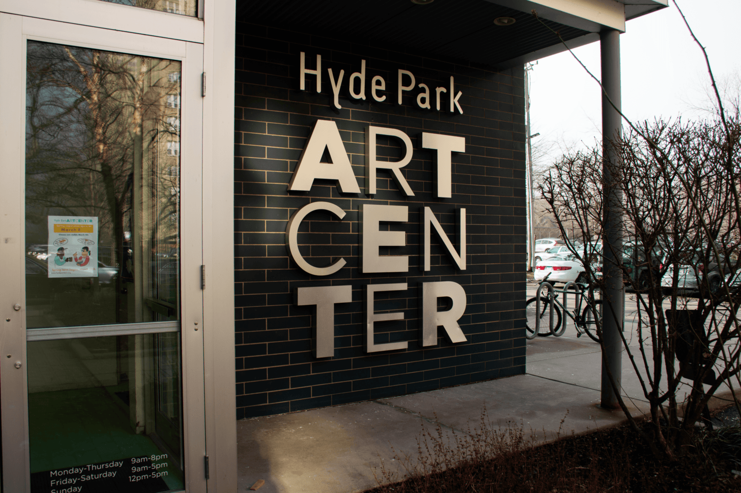 Exterior featuring the sign of the arts center.
