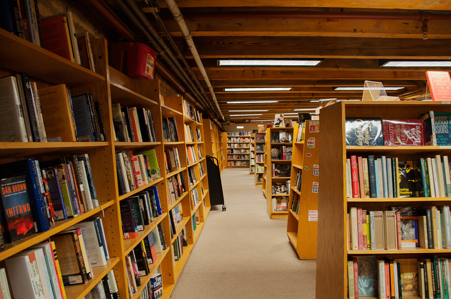 Colorful aisles of bookshelves in the basement of the store.